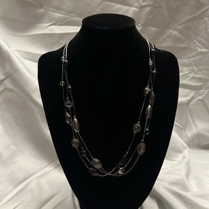 Three-Strand Beaded Necklace.